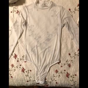 Two Sheer white body suits Charlotte Russe